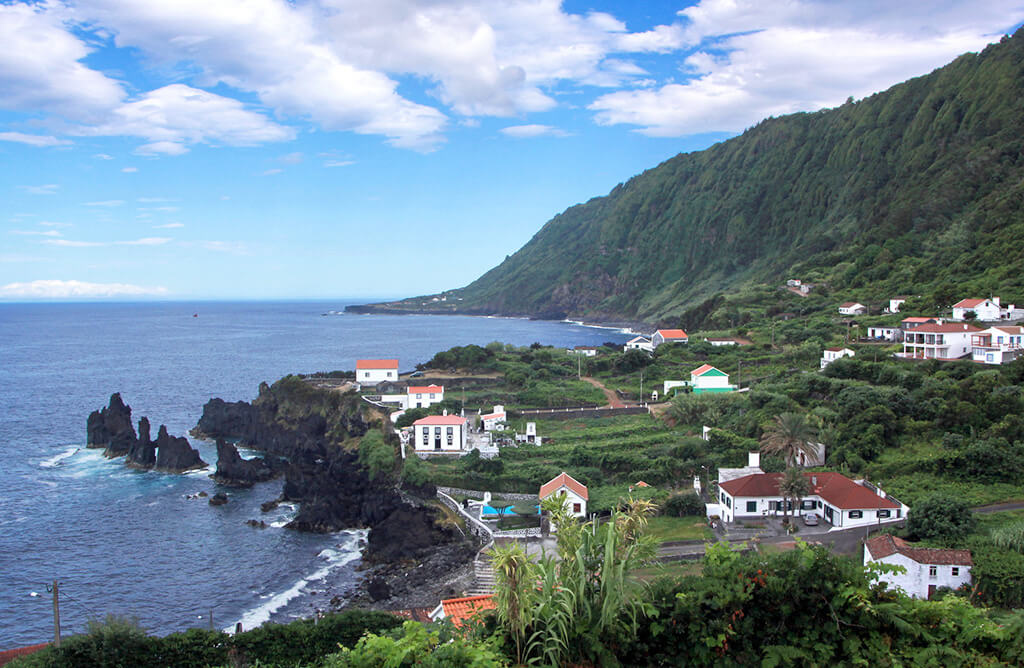 Fajã da Caldeira de Santo Cristo lagoon and cliffs